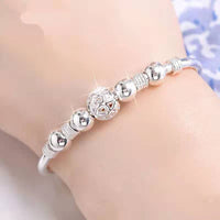 Armband mit Glücksperlen
